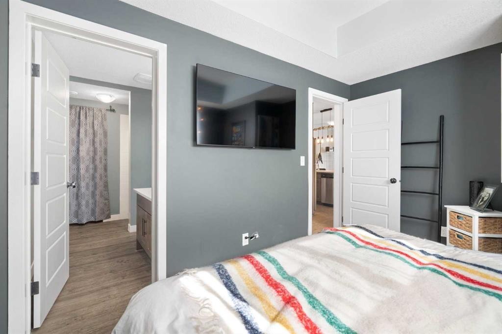 1104-2461 Baysprings Link Sw, Airdrie, AB - Indoor Photo Showing Bedroom