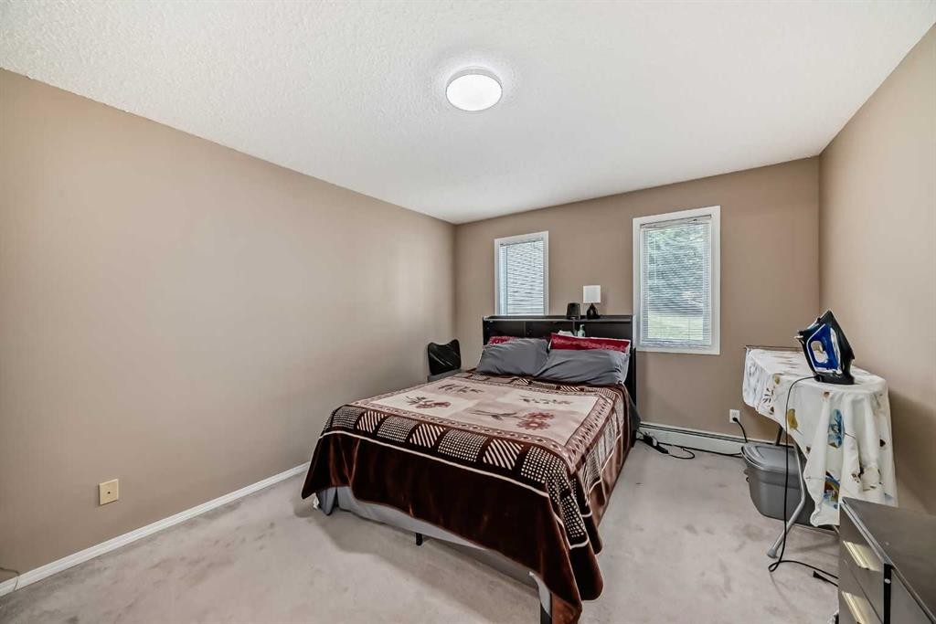 119-6000 Somervale Court Sw, Calgary, AB - Indoor Photo Showing Bedroom