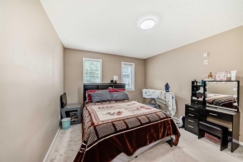 119-6000 Somervale Court Sw, Calgary, AB - Indoor Photo Showing Bedroom