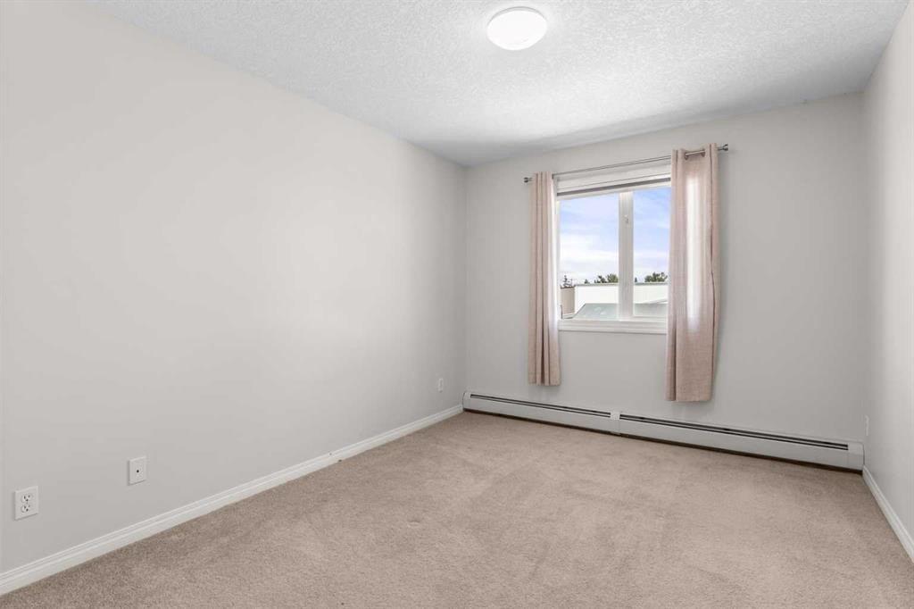 308-1010 Railway Street, Crossfield, AB - Indoor Photo Showing Other Room