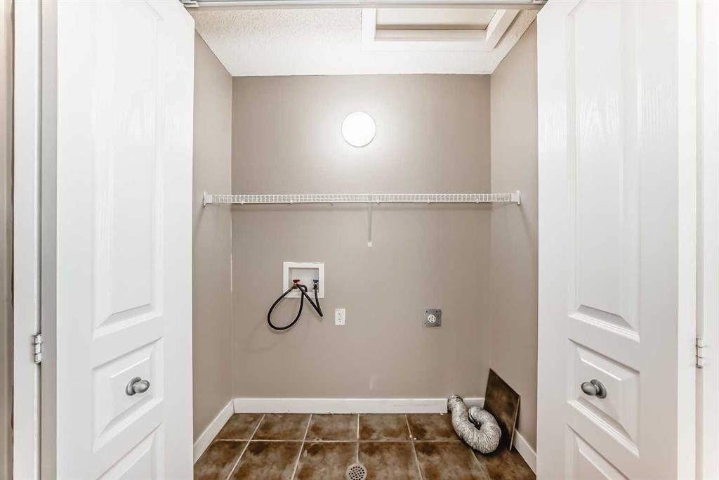 33 Cimarron Vista Gardens, Okotoks, AB - Indoor With Storage