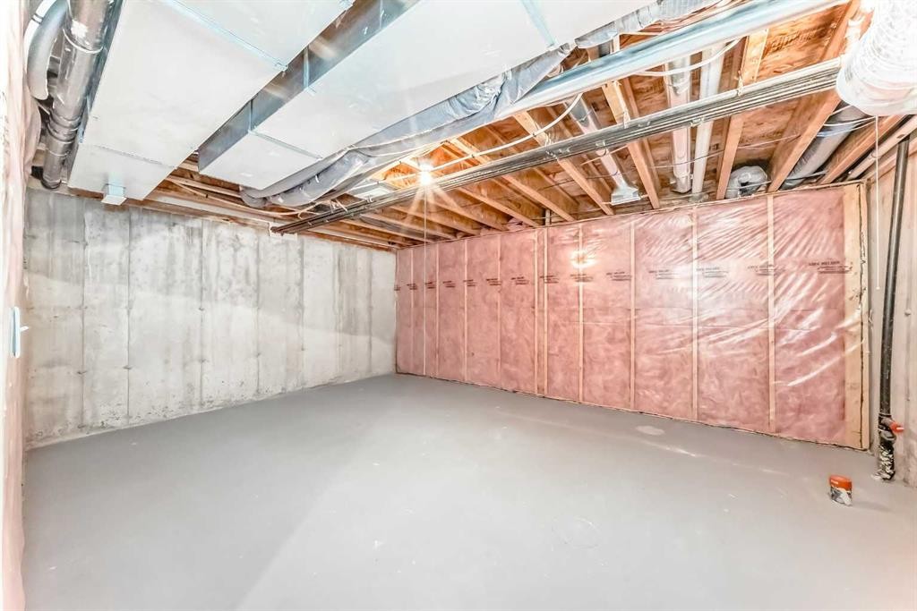 33 Cimarron Vista Gardens, Okotoks, AB - Indoor Photo Showing Basement