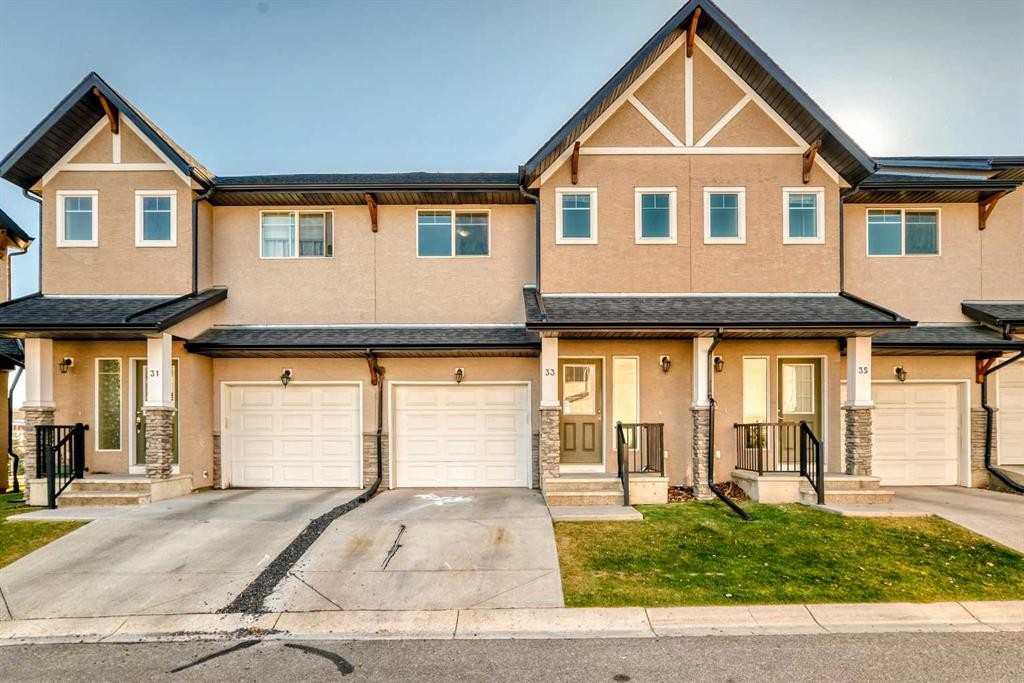 33 Cimarron Vista Gardens, Okotoks, AB - Outdoor With Facade