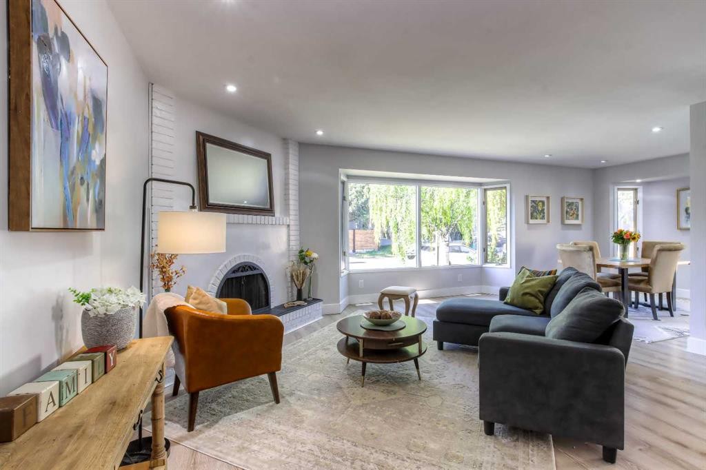 511 Cedarille Crescent Sw, Calgary, AB - Indoor Photo Showing Living Room With Fireplace