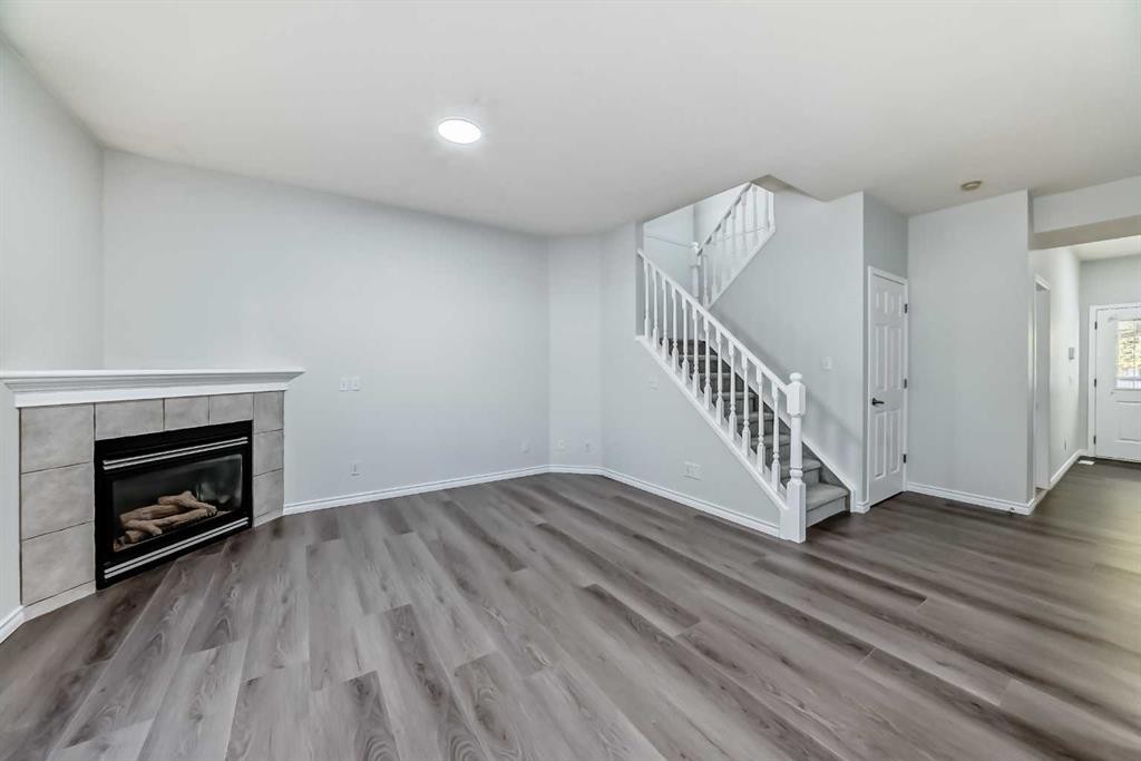 92 Simcoe Place Sw, Calgary, AB - Indoor With Fireplace