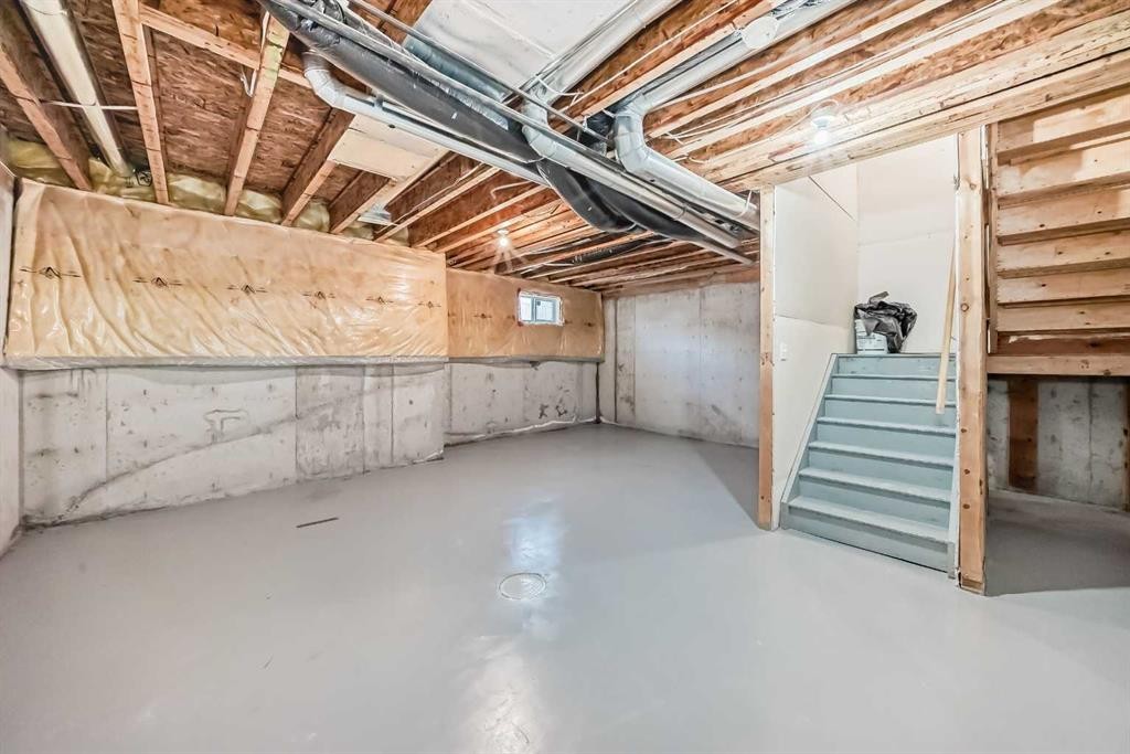 92 Simcoe Place Sw, Calgary, AB - Indoor Photo Showing Basement
