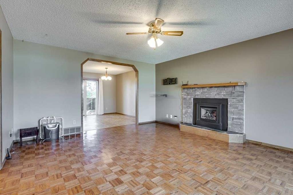 433 Regal Crescent, Trochu, AB - Indoor Photo Showing Living Room With Fireplace