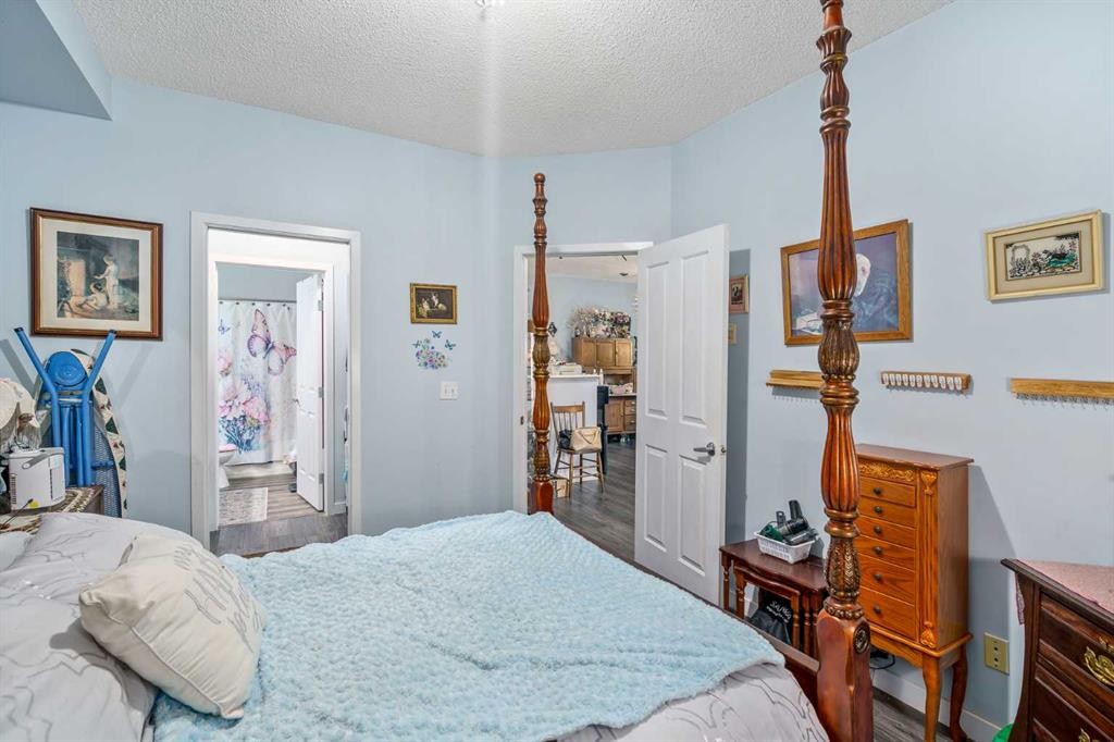 1116-1140 Taradale Drive Ne, Calgary, AB - Indoor Photo Showing Bedroom