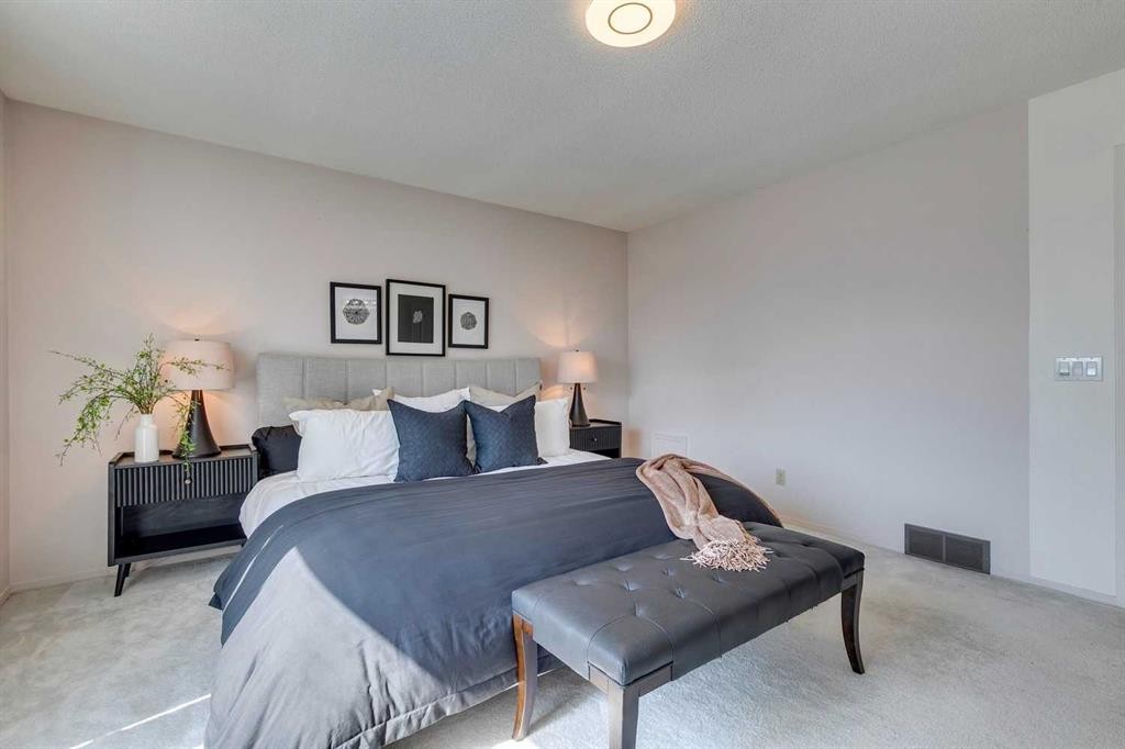33 Shawnee View Sw, Calgary, AB - Indoor Photo Showing Bedroom