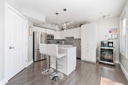 310-50 Westland Road Okotoks, AB T1S 2H4