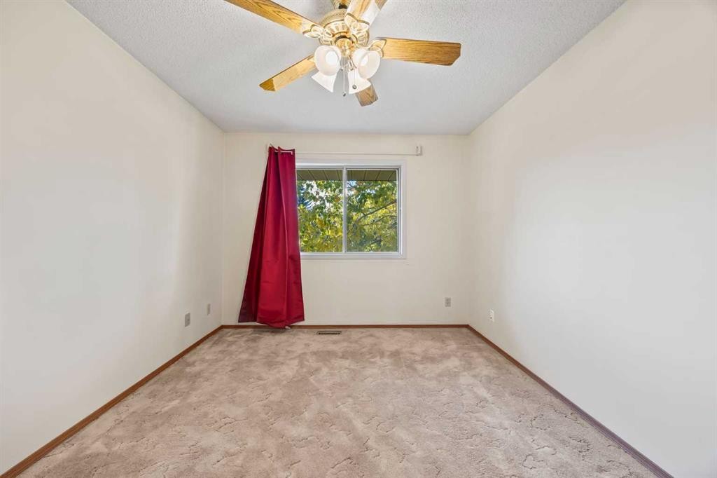 52 Sandarac Circle Nw, Calgary, AB - Indoor Photo Showing Other Room