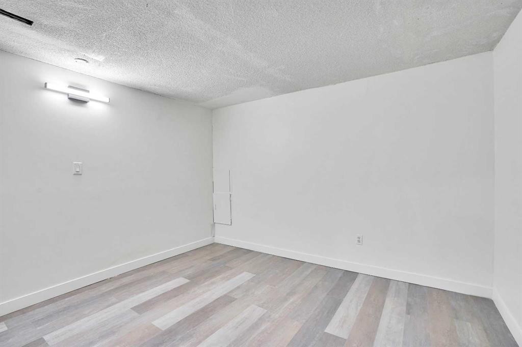 26 Falmead Bay Ne, Calgary, AB - Indoor Photo Showing Other Room