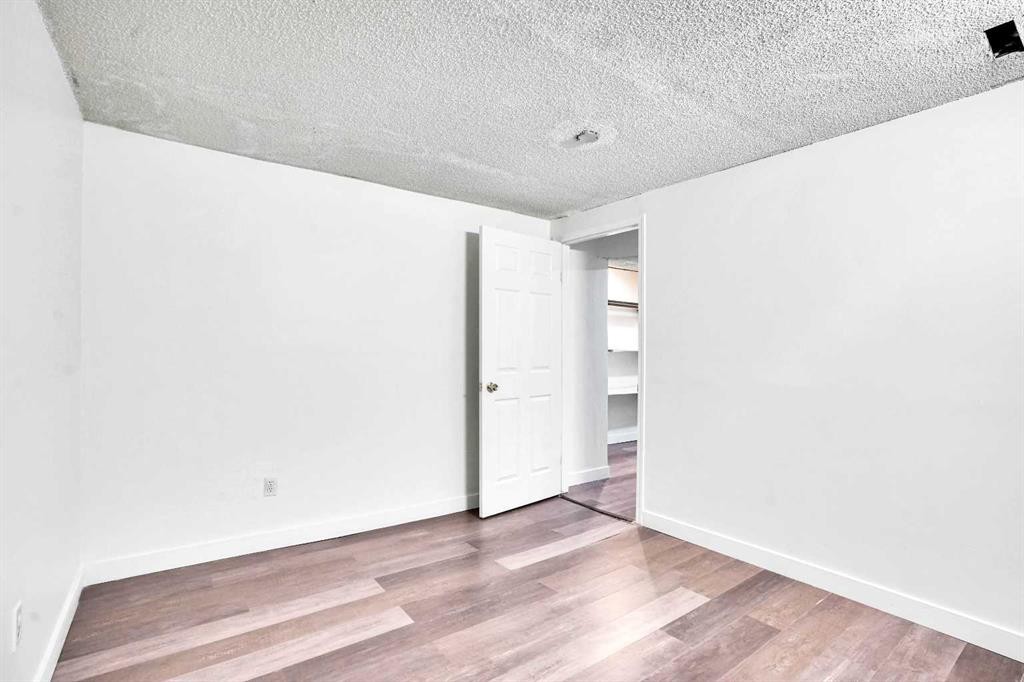 26 Falmead Bay Ne, Calgary, AB - Indoor Photo Showing Other Room