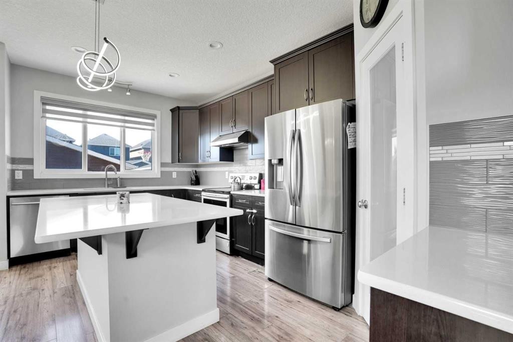 87 Redstone Boulevard Ne, Calgary, AB - Indoor Photo Showing Kitchen With Upgraded Kitchen