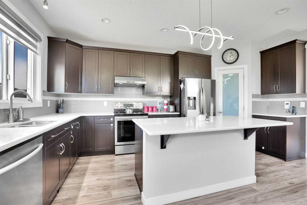 87 Redstone Boulevard Ne, Calgary, AB - Indoor Photo Showing Kitchen With Double Sink With Upgraded Kitchen