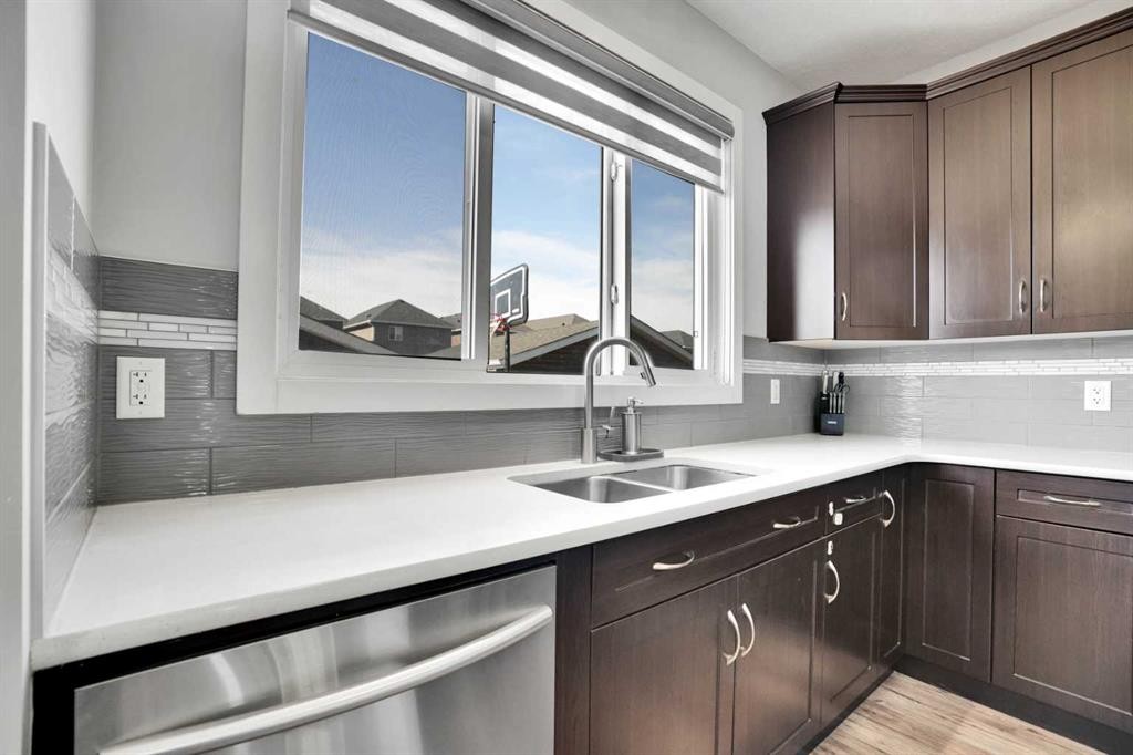 87 Redstone Boulevard Ne, Calgary, AB - Indoor Photo Showing Kitchen With Double Sink