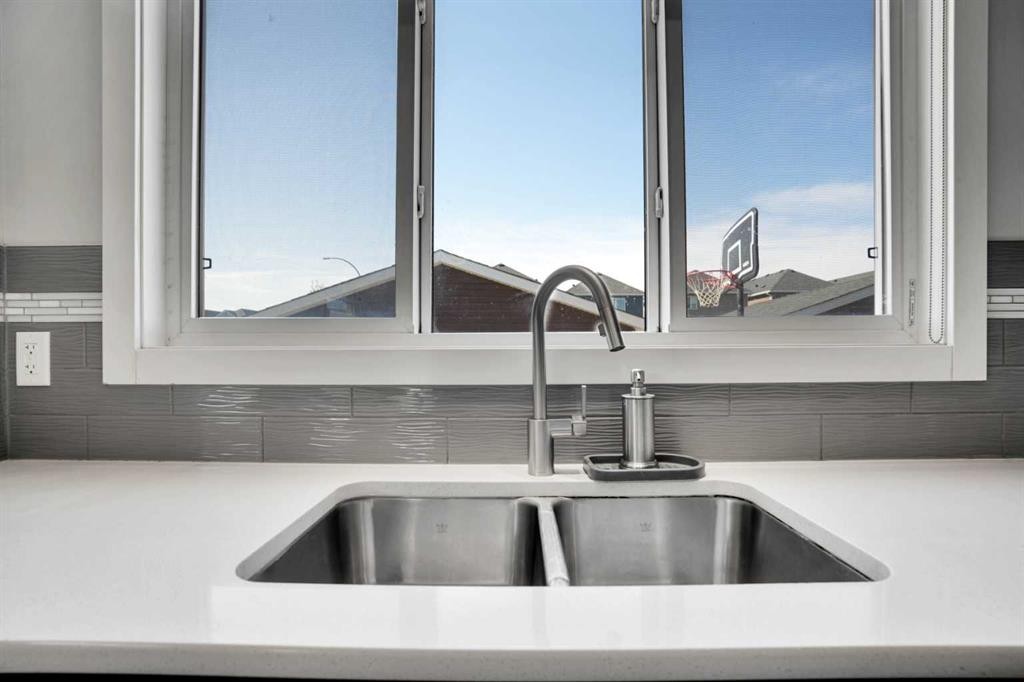 87 Redstone Boulevard Ne, Calgary, AB - Indoor Photo Showing Kitchen With Double Sink