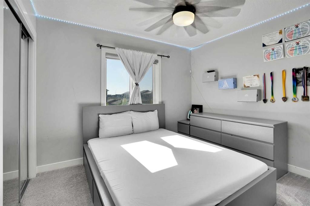 87 Redstone Boulevard Ne, Calgary, AB - Indoor Photo Showing Bedroom