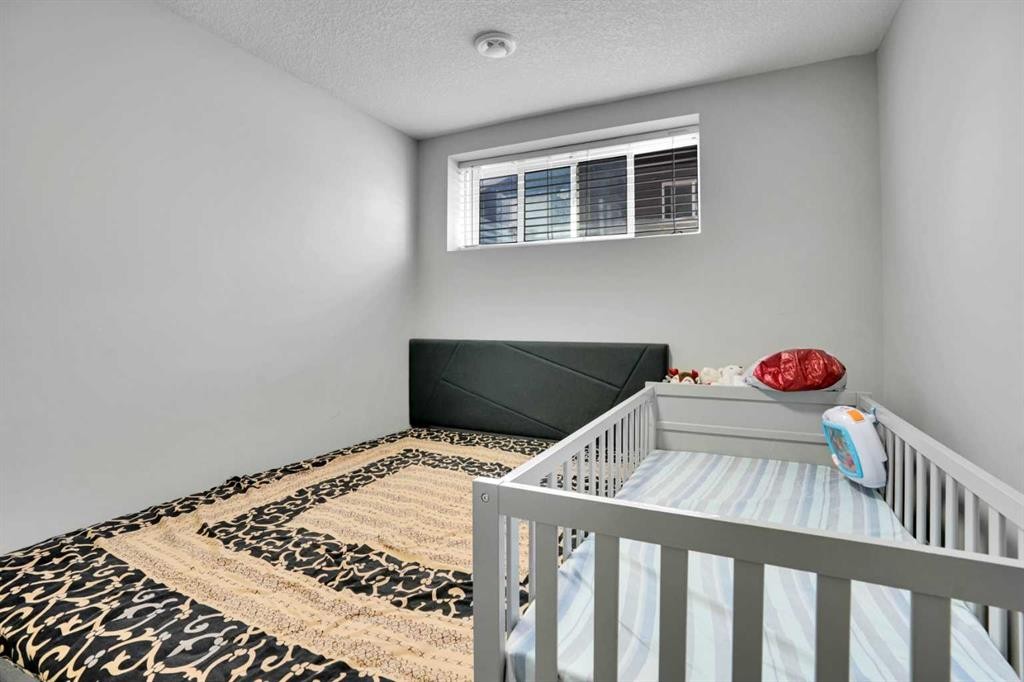 87 Redstone Boulevard Ne, Calgary, AB - Indoor Photo Showing Bedroom