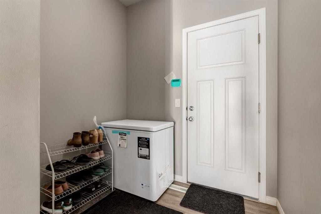 82 Howse Common Ne, Calgary, AB - Indoor Photo Showing Other Room