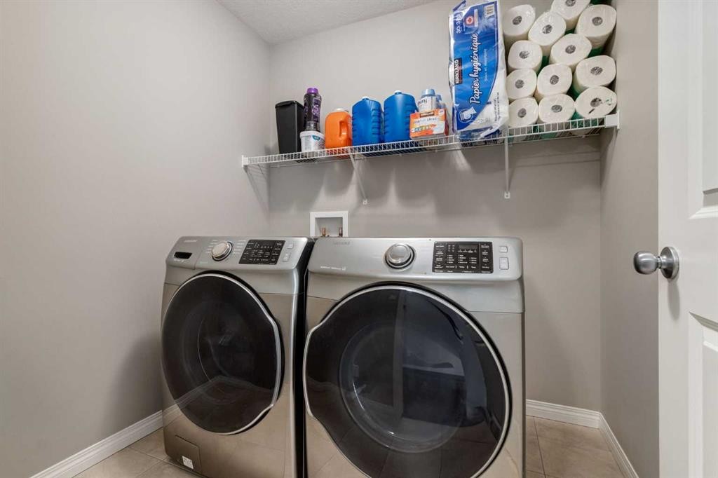 82 Howse Common Ne, Calgary, AB - Indoor Photo Showing Laundry Room