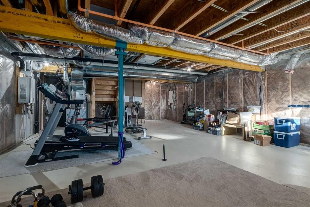 82 Howse Common Ne, Calgary, AB - Indoor Photo Showing Basement