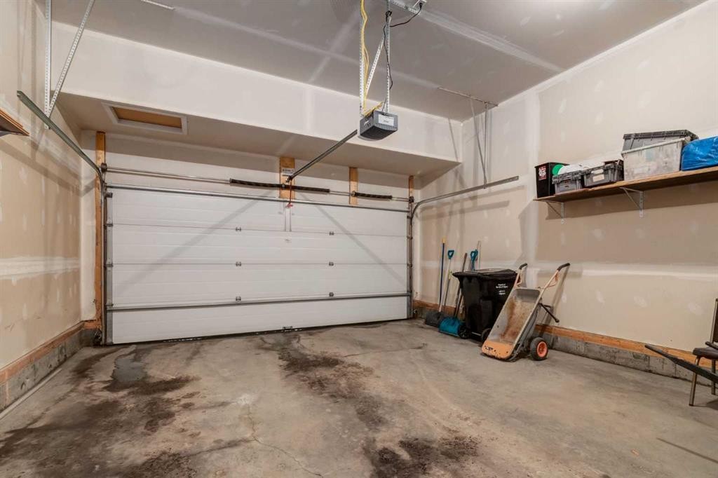 82 Howse Common Ne, Calgary, AB - Indoor Photo Showing Garage