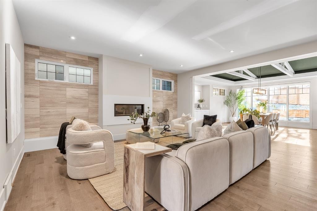 625 Britannia Drive Sw, Calgary, AB - Indoor Photo Showing Other Room With Fireplace