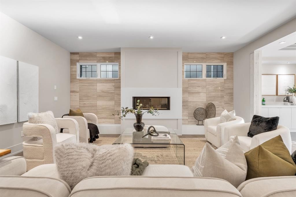625 Britannia Drive Sw, Calgary, AB - Indoor Photo Showing Living Room With Fireplace
