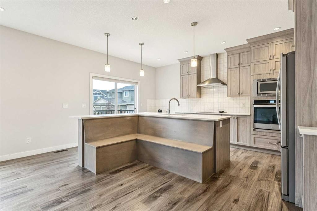 118 Saddlestone Park Ne, Calgary, AB - Indoor Photo Showing Kitchen With Upgraded Kitchen