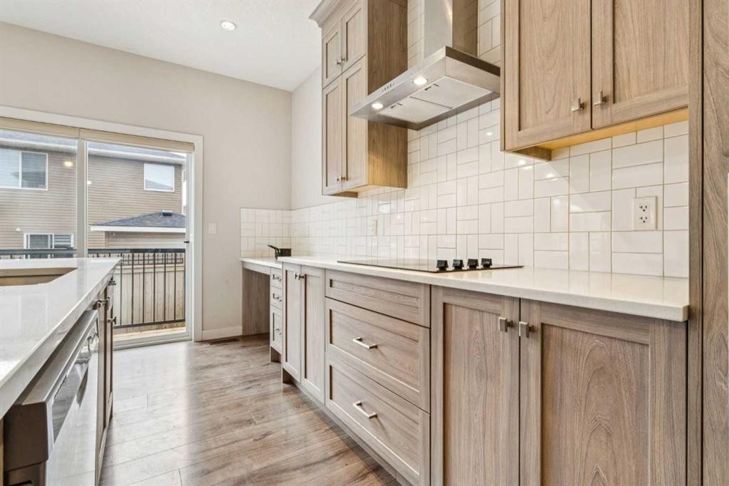 118 Saddlestone Park Ne, Calgary, AB - Indoor Photo Showing Kitchen With Upgraded Kitchen