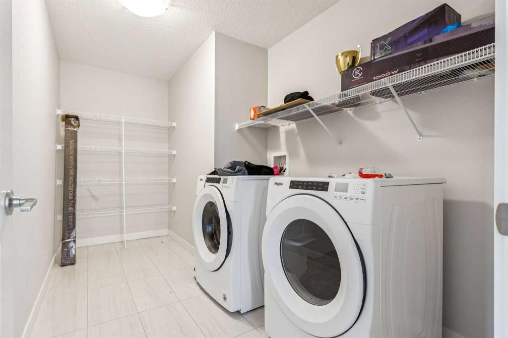 118 Saddlestone Park Ne, Calgary, AB - Indoor Photo Showing Laundry Room
