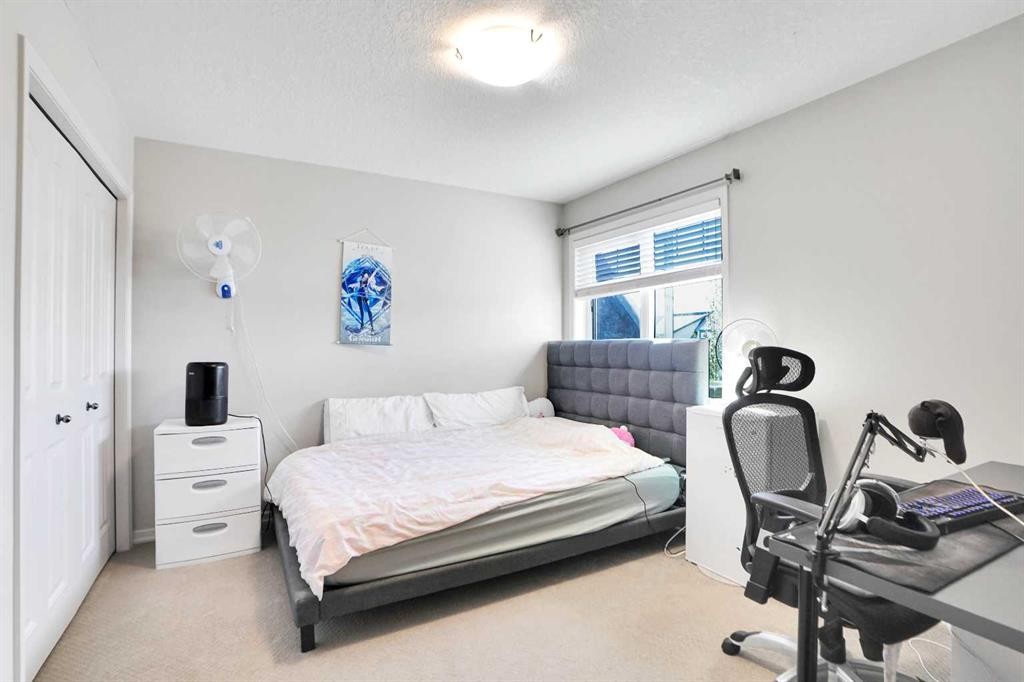 60 Cranarch Rise Se, Calgary, AB - Indoor Photo Showing Bedroom