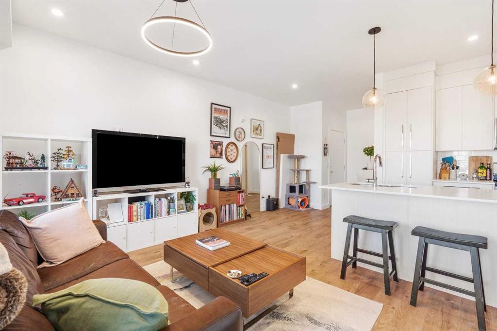 2415-681 Savanna Boulevard Ne, Calgary, AB - Indoor Photo Showing Living Room