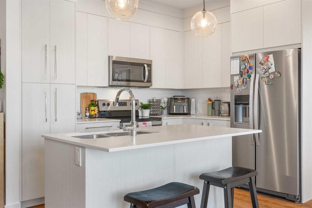 2415-681 Savanna Boulevard Ne, Calgary, AB - Indoor Photo Showing Kitchen With Stainless Steel Kitchen With Upgraded Kitchen