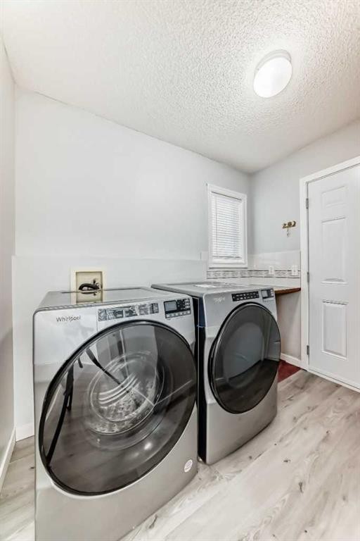 10134 Hidden Valley Drive Nw, Calgary, AB - Indoor Photo Showing Laundry Room