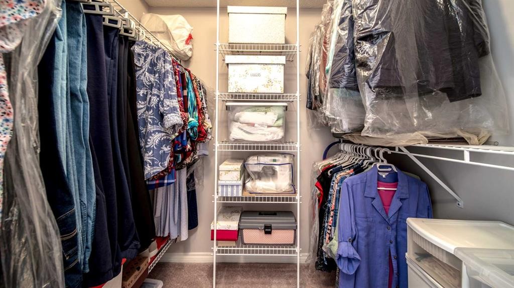 2206-7451 Springbank Boulevard Sw, Calgary, AB - Indoor With Storage