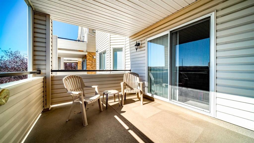 2206-7451 Springbank Boulevard Sw, Calgary, AB - Outdoor With Deck Patio Veranda With Exterior
