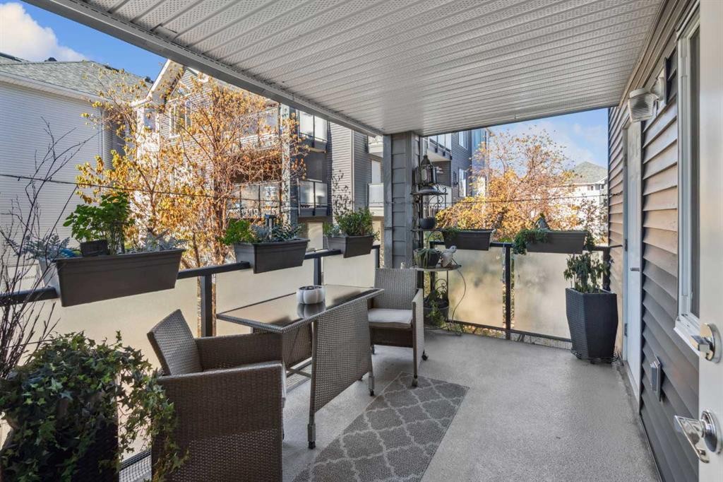 204-30 Sierra Morena Mews Sw, Calgary, AB - Outdoor With Deck Patio Veranda With Exterior