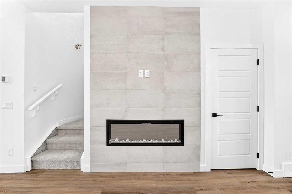 5005 Harmony Circle, Rural Rocky View County, AB - Indoor With Fireplace
