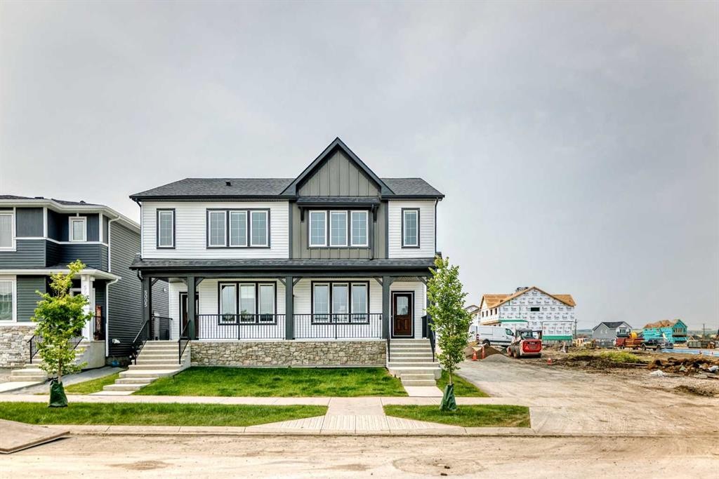 5005 Harmony Circle, Rural Rocky View County, AB - Outdoor With Facade
