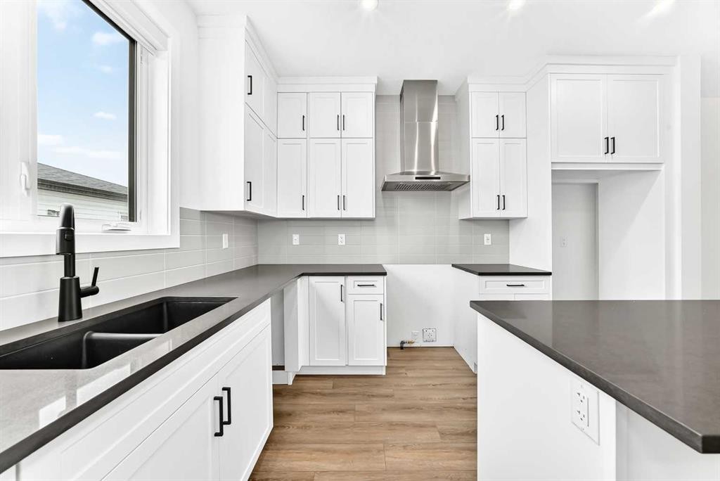 5005 Harmony Circle, Rural Rocky View County, AB - Indoor Photo Showing Kitchen With Double Sink