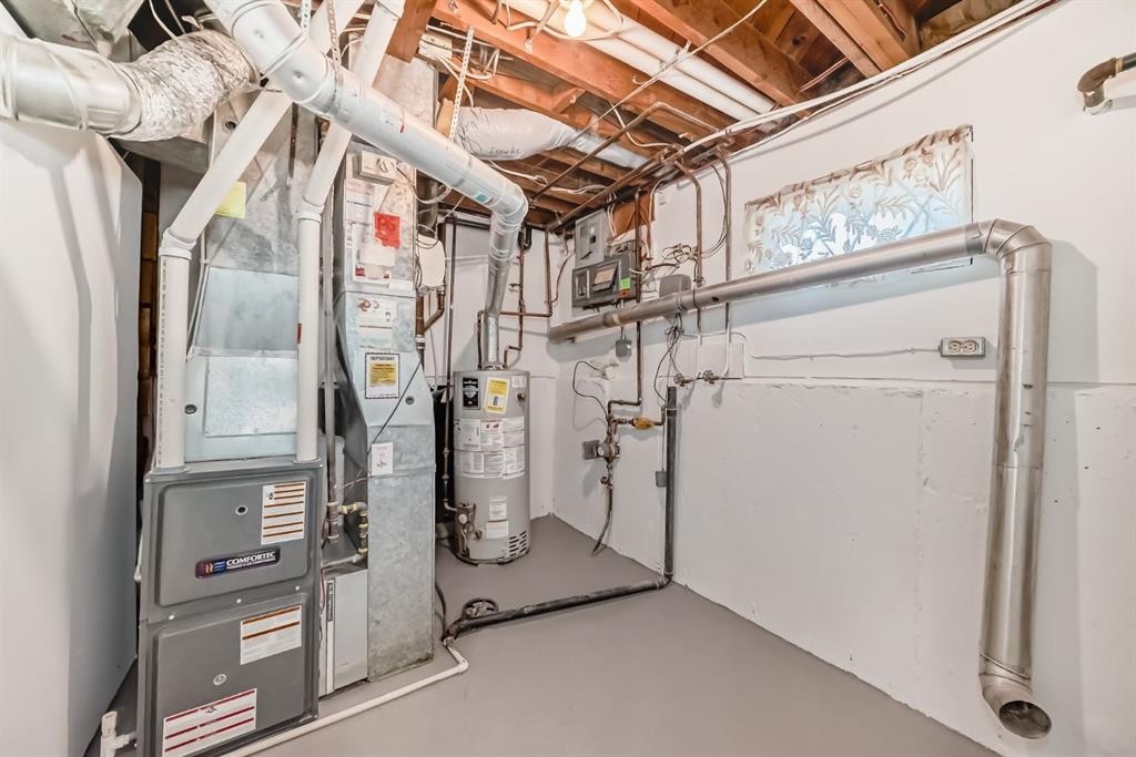 129 Glenpatrick Drive Sw, Calgary, AB - Indoor Photo Showing Basement