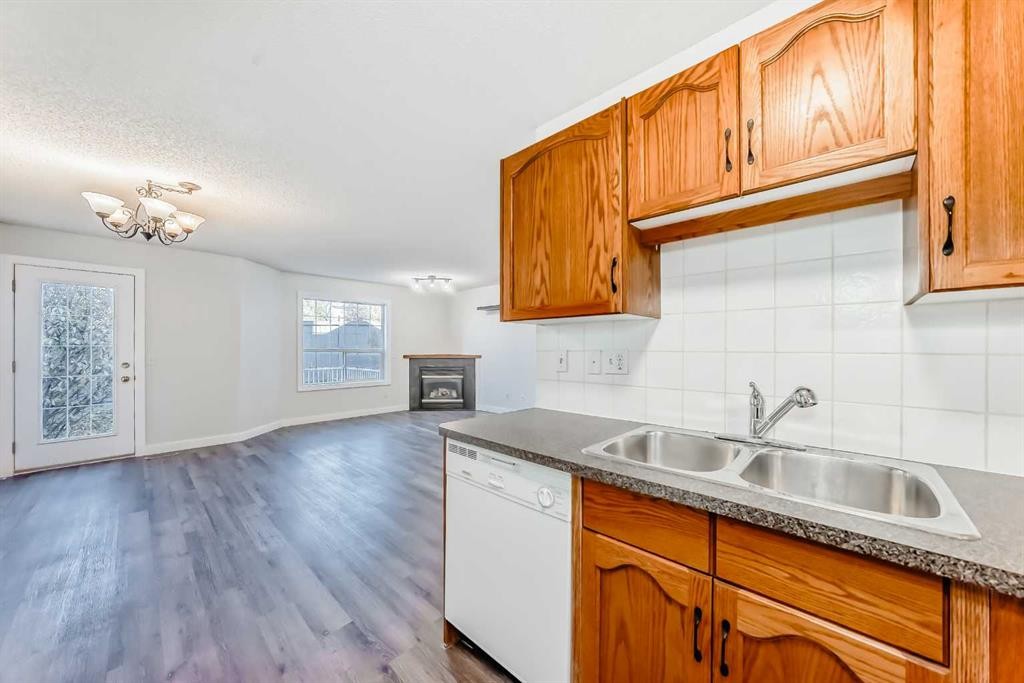 184 Mt Aberdeen Manor Se, Calgary, AB - Indoor Photo Showing Kitchen With Double Sink