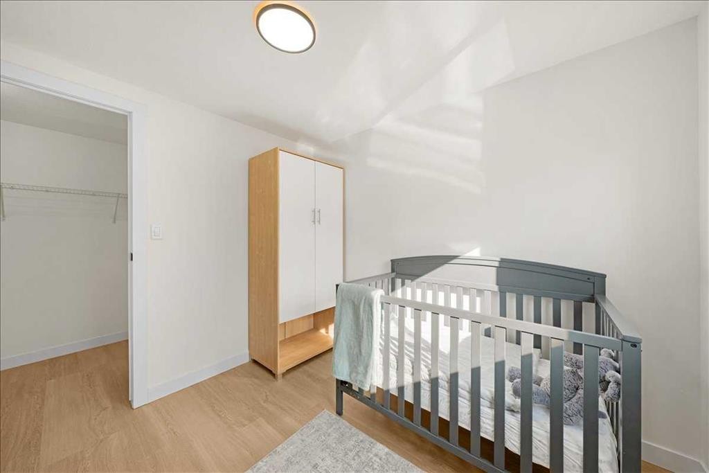 210 Erin Woods Circle Se, Calgary, AB - Indoor Photo Showing Bedroom