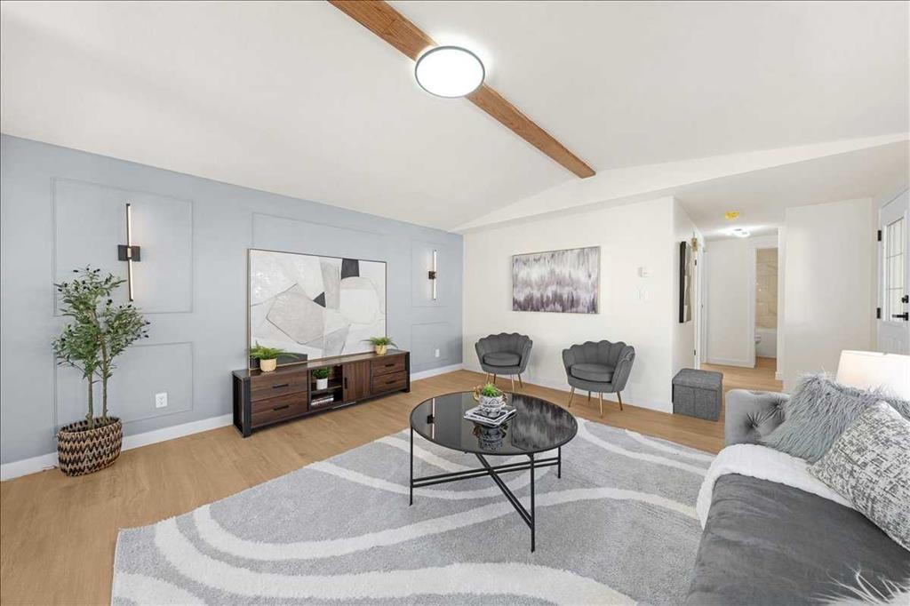 210 Erin Woods Circle Se, Calgary, AB - Indoor Photo Showing Living Room
