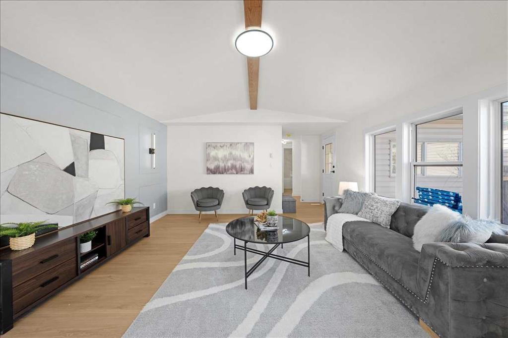 210 Erin Woods Circle Se, Calgary, AB - Indoor Photo Showing Living Room