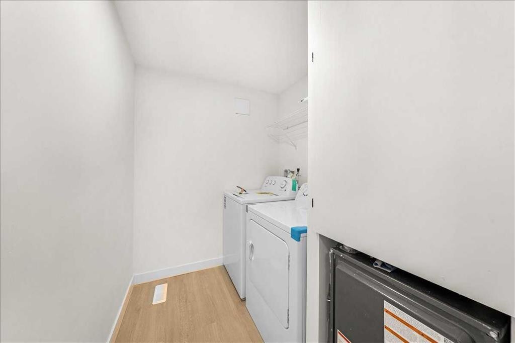 210 Erin Woods Circle Se, Calgary, AB - Indoor Photo Showing Laundry Room
