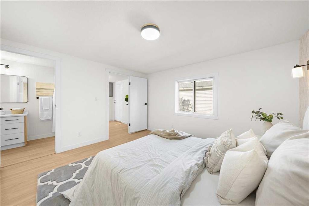 210 Erin Woods Circle Se, Calgary, AB - Indoor Photo Showing Bedroom