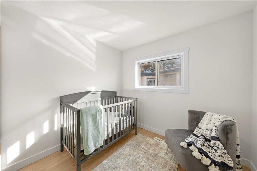 210 Erin Woods Circle Se, Calgary, AB - Indoor Photo Showing Bedroom